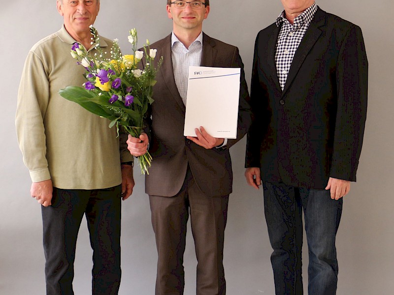 (v.r.n.l.) Prof. Dr. Ralph Großmann, Rektor FHD, Prof. Dr. Nico Stengel, Günter Kahle, Geschäftsführer FHD
