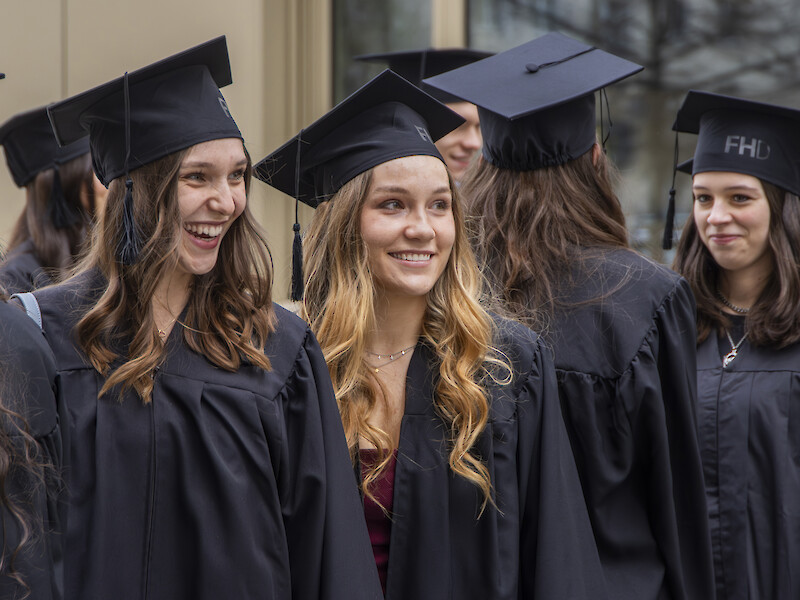 Before the ceremony, the graduates were dressed in gowns and graduation caps.